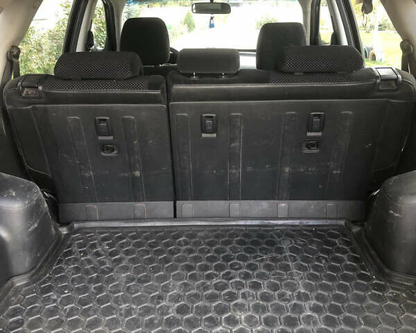 Черный Хендай Туксон, объемом двигателя 1.98 л и пробегом 256 тыс. км за 8200 $, фото 11 на Automoto.ua