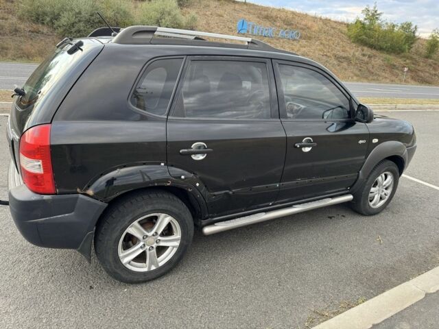 Чорний Хендай Туксон, об'ємом двигуна 2 л та пробігом 291 тис. км за 5400 $, фото 4 на Automoto.ua