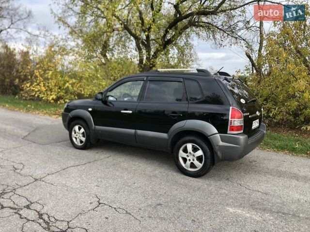 Чорний Хендай Туксон, об'ємом двигуна 1.98 л та пробігом 220 тис. км за 8000 $, фото 4 на Automoto.ua