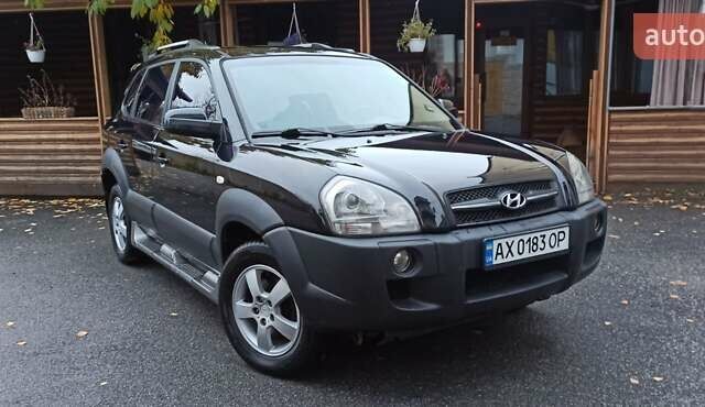 Хендай Туксон 2008 у Харкові на Automoto.ua Чорний Хендай Туксон, об'ємом двигуна 1.99 л та пробігом 188 тис. км за 8800 $, фото 6 на Automoto.ua