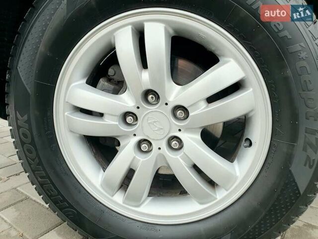 Чорний Хендай Туксон, об'ємом двигуна 2 л та пробігом 225 тис. км за 8000 $, фото 21 на Automoto.ua