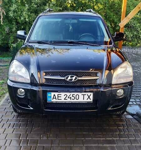 Чорний Хендай Туксон, об'ємом двигуна 2 л та пробігом 148 тис. км за 9200 $, фото 1 на Automoto.ua