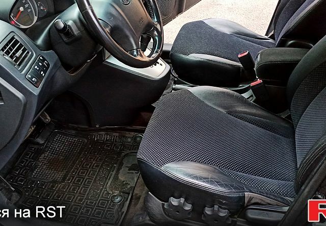 Чорний Хендай Туксон, об'ємом двигуна 2 л та пробігом 188 тис. км за 8800 $, фото 8 на Automoto.ua