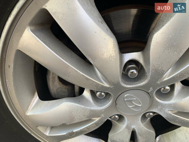 Черный Хендай Туксон, объемом двигателя 1.98 л и пробегом 260 тыс. км за 7777 $, фото 22 на Automoto.ua