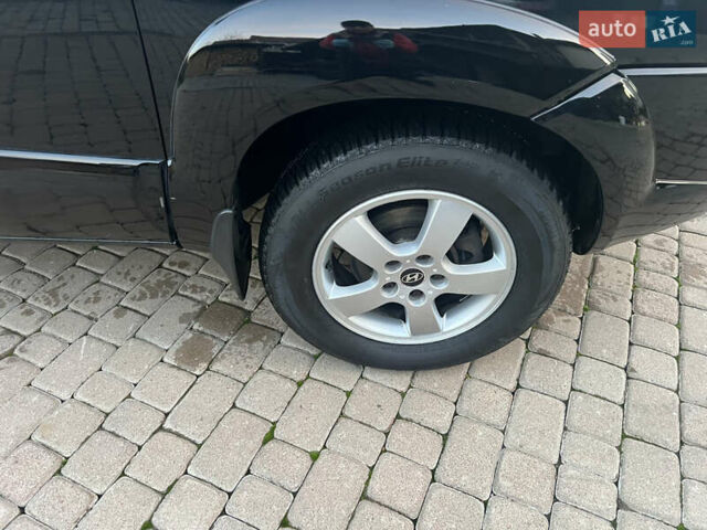 Черный Хендай Туксон, объемом двигателя 2 л и пробегом 276 тыс. км за 7450 $, фото 20 на Automoto.ua