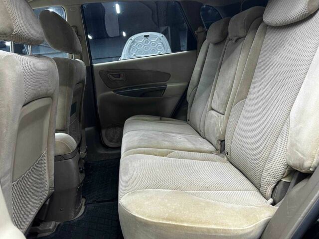 Черный Хендай Туксон, объемом двигателя 2 л и пробегом 224 тыс. км за 7800 $, фото 9 на Automoto.ua