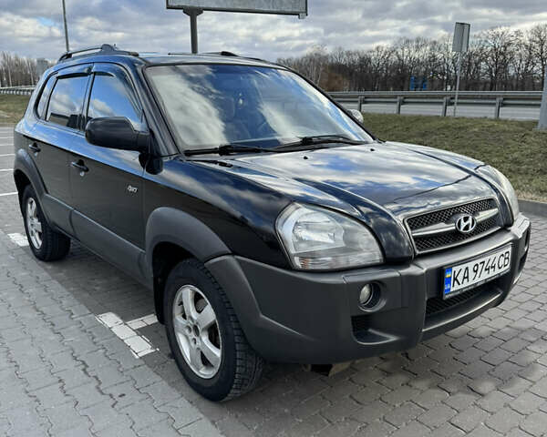 Чорний Хендай Туксон, об'ємом двигуна 1.98 л та пробігом 318 тис. км за 7399 $, фото 6 на Automoto.ua
