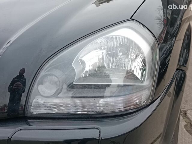 Чорний Хендай Туксон, об'ємом двигуна 2 л та пробігом 192 тис. км за 7990 $, фото 4 на Automoto.ua