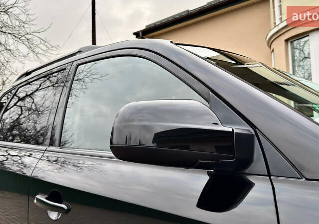 Чорний Хендай Туксон, об'ємом двигуна 2 л та пробігом 182 тис. км за 8299 $, фото 83 на Automoto.ua