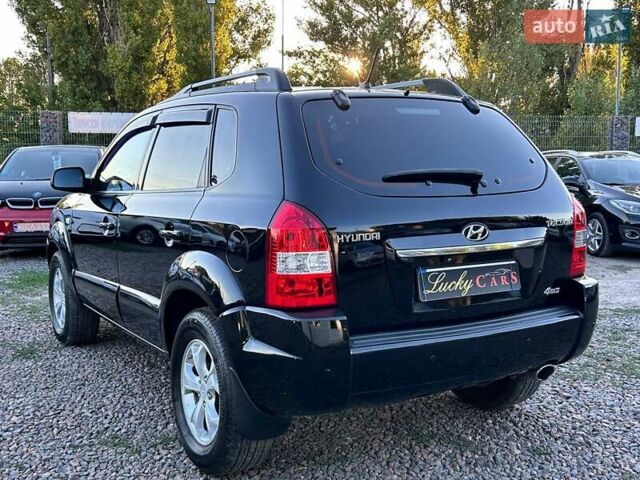 Черный Хендай Туксон, объемом двигателя 2 л и пробегом 230 тыс. км за 7500 $, фото 6 на Automoto.ua