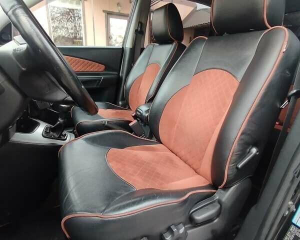 Черный Хендай Туксон, объемом двигателя 1.98 л и пробегом 214 тыс. км за 7700 $, фото 21 на Automoto.ua