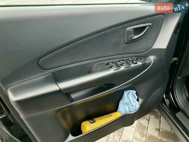 Чорний Хендай Туксон, об'ємом двигуна 2 л та пробігом 225 тис. км за 8000 $, фото 41 на Automoto.ua