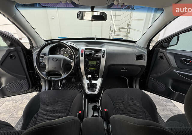 Черный Хендай Туксон, объемом двигателя 2 л и пробегом 67 тыс. км за 9999 $, фото 32 на Automoto.ua