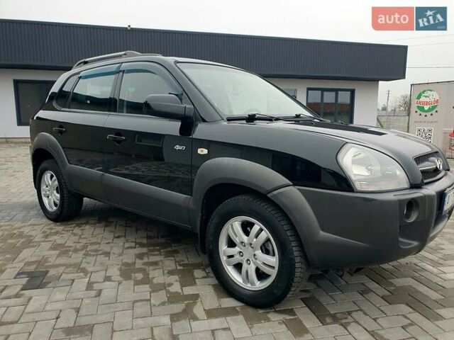Чорний Хендай Туксон, об'ємом двигуна 2 л та пробігом 225 тис. км за 8000 $, фото 2 на Automoto.ua