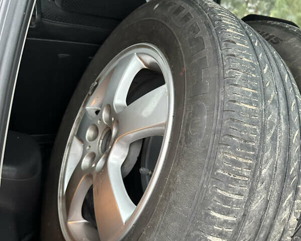 Черный Хендай Туксон, объемом двигателя 2 л и пробегом 136 тыс. км за 8500 $, фото 31 на Automoto.ua