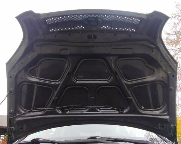 Черный Хендай Туксон, объемом двигателя 1.98 л и пробегом 214 тыс. км за 7700 $, фото 31 на Automoto.ua