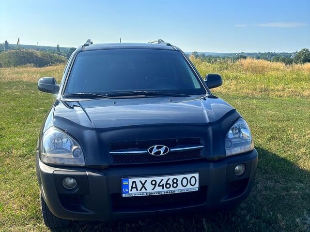 Чорний Хендай Туксон, об'ємом двигуна 2 л та пробігом 215 тис. км за 8500 $, фото 1 на Automoto.ua