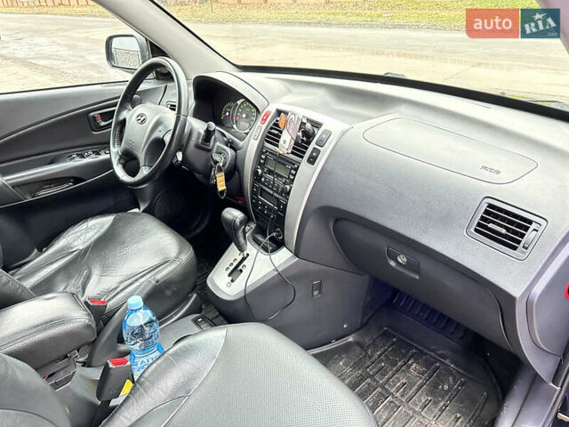 Чорний Хендай Туксон, об'ємом двигуна 2.66 л та пробігом 395 тис. км за 9950 $, фото 16 на Automoto.ua