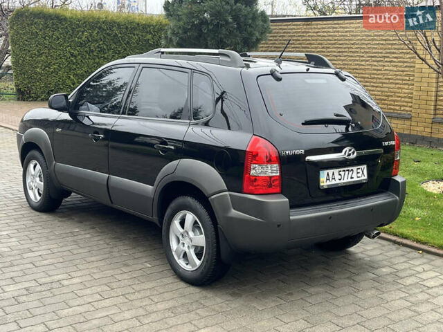 Черный Хендай Туксон, объемом двигателя 2 л и пробегом 107 тыс. км за 8900 $, фото 11 на Automoto.ua