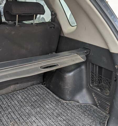 Черный Хендай Туксон, объемом двигателя 2 л и пробегом 163 тыс. км за 8100 $, фото 7 на Automoto.ua