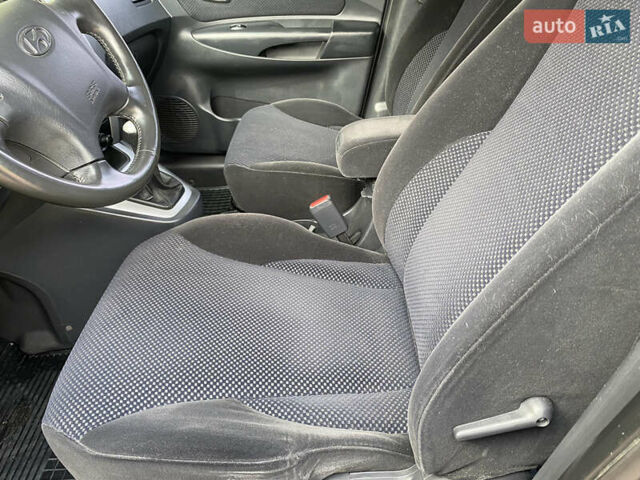 Чорний Хендай Туксон, об'ємом двигуна 2 л та пробігом 160 тис. км за 8800 $, фото 12 на Automoto.ua