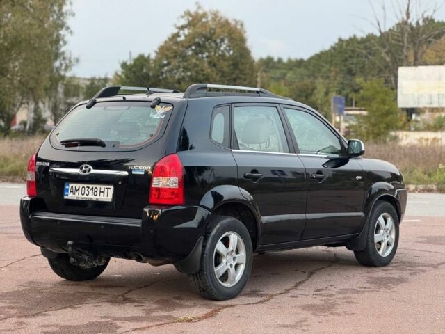 Черный Хендай Туксон, объемом двигателя 2 л и пробегом 353 тыс. км за 6800 $, фото 3 на Automoto.ua