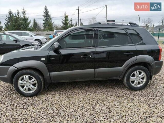 Чорний Хендай Туксон, об'ємом двигуна 2 л та пробігом 185 тис. км за 7499 $, фото 22 на Automoto.ua