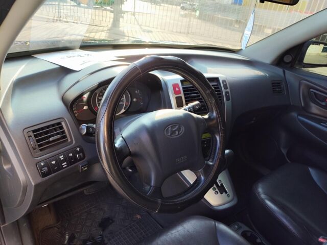 Черный Хендай Туксон, объемом двигателя 2 л и пробегом 82 тыс. км за 7490 $, фото 16 на Automoto.ua