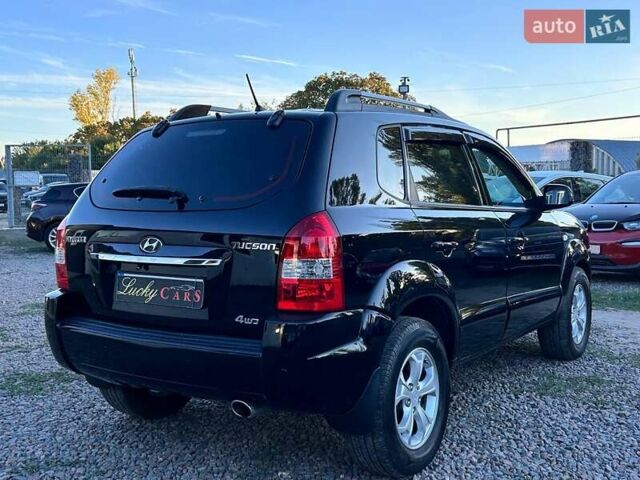 Черный Хендай Туксон, объемом двигателя 2 л и пробегом 230 тыс. км за 7500 $, фото 4 на Automoto.ua