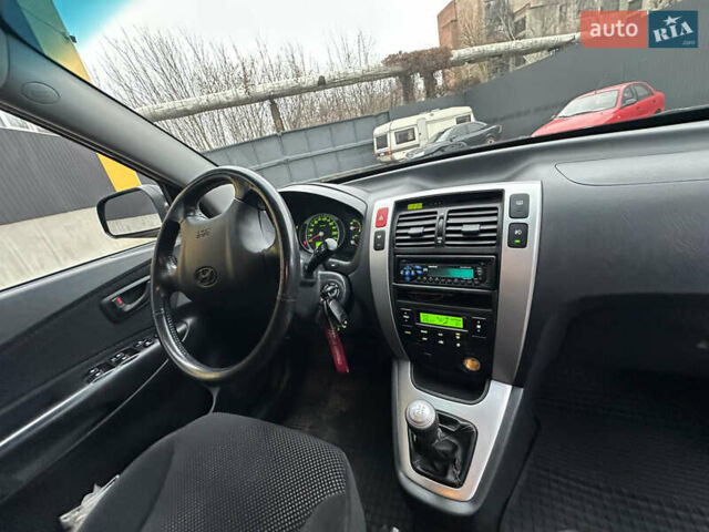 Чорний Хендай Туксон, об'ємом двигуна 2 л та пробігом 243 тис. км за 7999 $, фото 30 на Automoto.ua