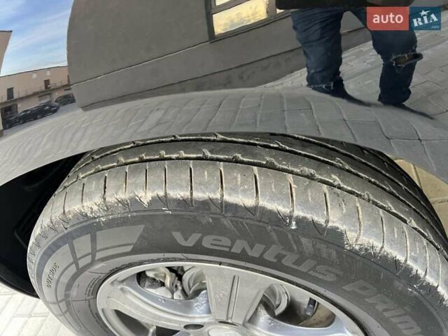 Черный Хендай Туксон, объемом двигателя 1.98 л и пробегом 185 тыс. км за 8500 $, фото 52 на Automoto.ua