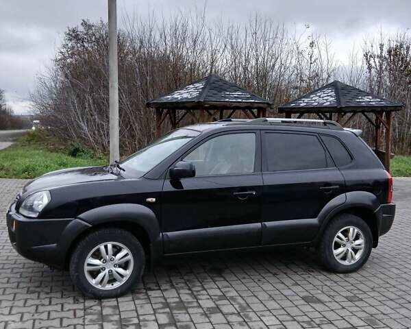 Черный Хендай Туксон, объемом двигателя 2 л и пробегом 230 тыс. км за 8000 $, фото 5 на Automoto.ua