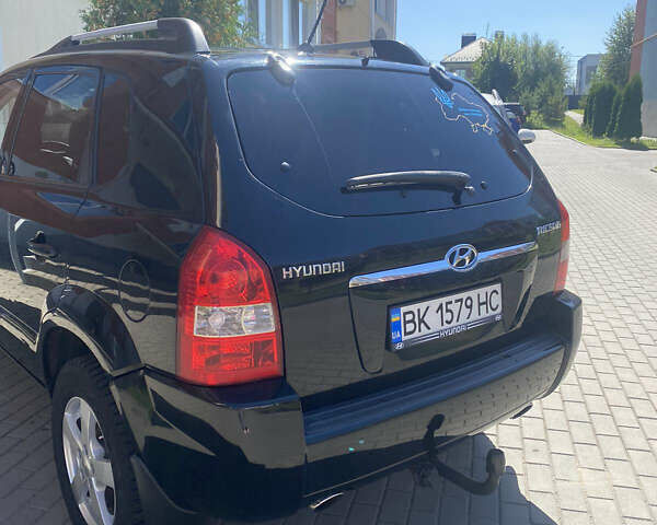 Чорний Хендай Туксон, об'ємом двигуна 1.99 л та пробігом 230 тис. км за 8000 $, фото 3 на Automoto.ua