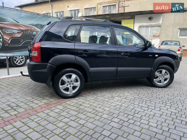Черный Хендай Туксон, объемом двигателя 1.98 л и пробегом 177 тыс. км за 7600 $, фото 7 на Automoto.ua