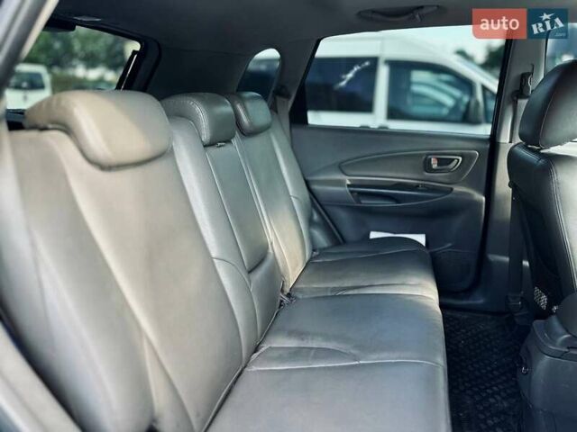 Черный Хендай Туксон, объемом двигателя 1.98 л и пробегом 206 тыс. км за 8300 $, фото 10 на Automoto.ua