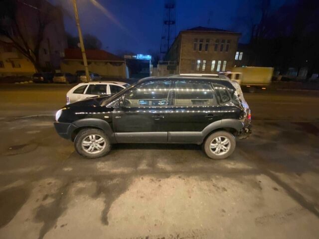 Черный Хендай Туксон, объемом двигателя 2 л и пробегом 136 тыс. км за 2500 $, фото 10 на Automoto.ua