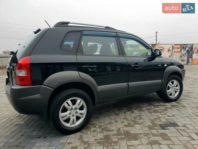 Чорний Хендай Туксон, об'ємом двигуна 2 л та пробігом 225 тис. км за 8000 $, фото 14 на Automoto.ua