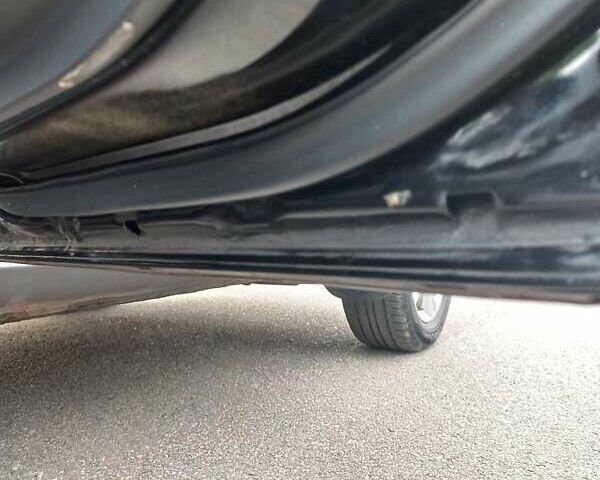 Черный Хендай Туксон, объемом двигателя 2 л и пробегом 168 тыс. км за 9000 $, фото 48 на Automoto.ua