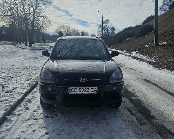 Чорний Хендай Туксон, об'ємом двигуна 2 л та пробігом 199 тис. км за 8500 $, фото 37 на Automoto.ua