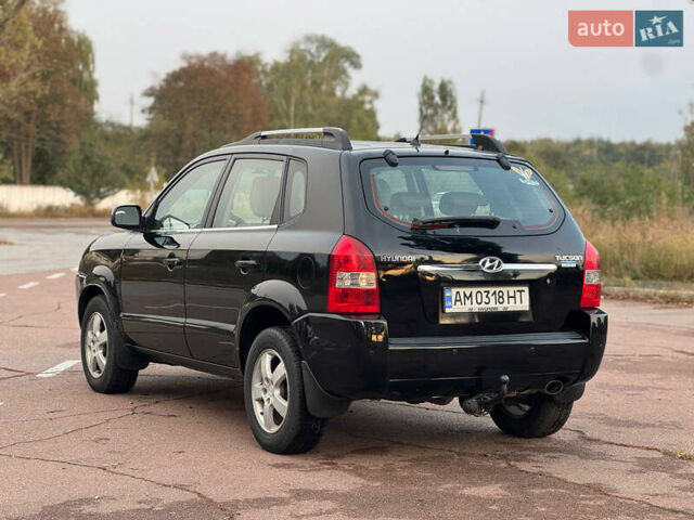 Черный Хендай Туксон, объемом двигателя 2 л и пробегом 361 тыс. км за 6499 $, фото 2 на Automoto.ua