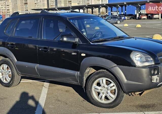 Чорний Хендай Туксон, об'ємом двигуна 1.98 л та пробігом 212 тис. км за 7766 $, фото 7 на Automoto.ua