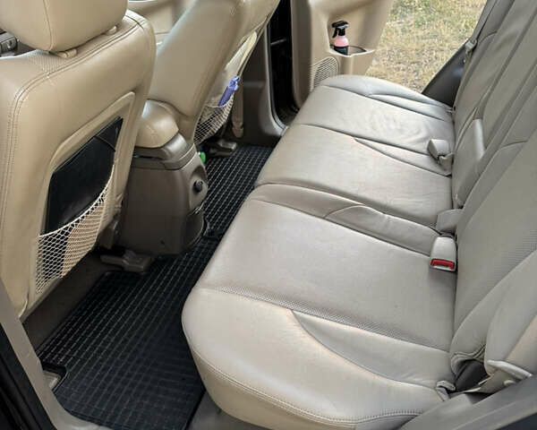 Черный Хендай Туксон, объемом двигателя 2 л и пробегом 323 тыс. км за 9300 $, фото 20 на Automoto.ua