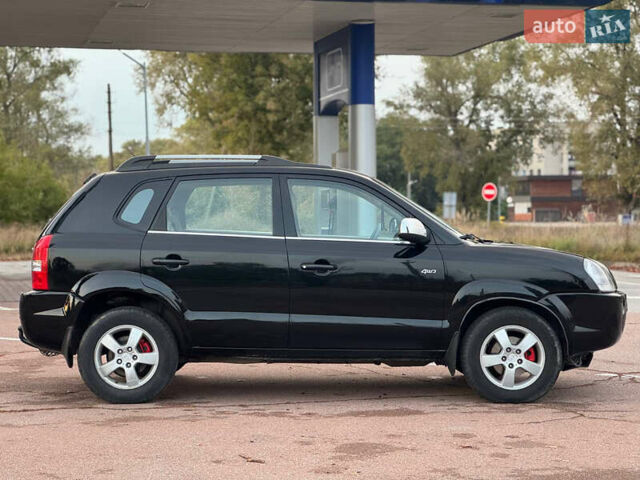 Черный Хендай Туксон, объемом двигателя 2 л и пробегом 361 тыс. км за 6499 $, фото 6 на Automoto.ua