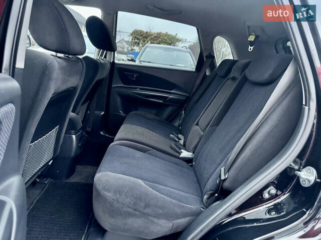 Черный Хендай Туксон, объемом двигателя 1.98 л и пробегом 96 тыс. км за 9900 $, фото 8 на Automoto.ua