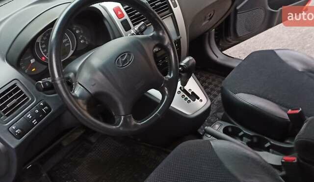 Хендай Туксон 2008 у Харкові на Automoto.ua Чорний Хендай Туксон, об'ємом двигуна 1.99 л та пробігом 188 тис. км за 8800 $, фото 21 на Automoto.ua