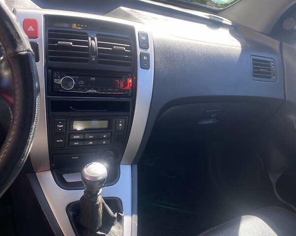 Чорний Хендай Туксон, об'ємом двигуна 1.99 л та пробігом 230 тис. км за 8000 $, фото 12 на Automoto.ua