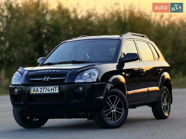 Черный Хендай Туксон, объемом двигателя 2 л и пробегом 250 тыс. км за 7600 $, фото 5 на Automoto.ua