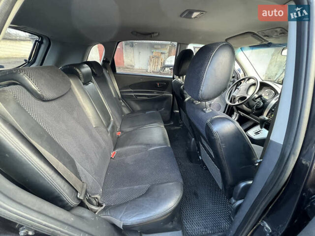 Чорний Хендай Туксон, об'ємом двигуна 2 л та пробігом 240 тис. км за 8500 $, фото 16 на Automoto.ua