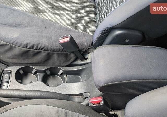 Черный Хендай Туксон, объемом двигателя 2 л и пробегом 163 тыс. км за 8100 $, фото 29 на Automoto.ua