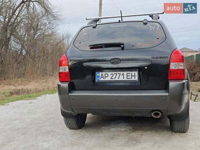 Черный Хендай Туксон, объемом двигателя 2 л и пробегом 182 тыс. км за 9000 $, фото 3 на Automoto.ua